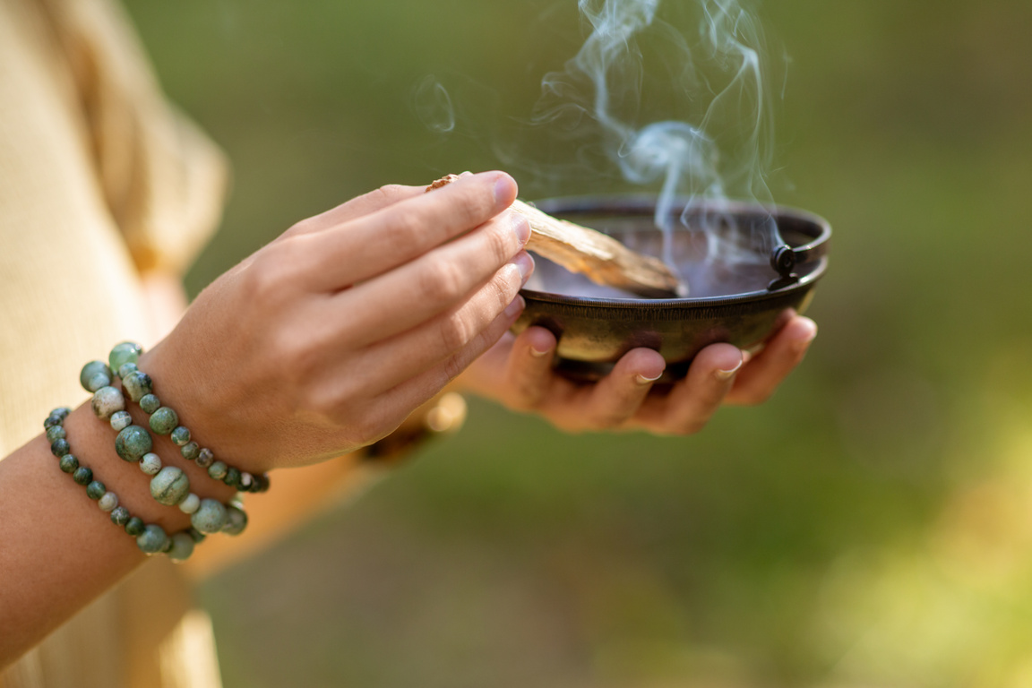 Woman with Palo Santo Performing Magic Ritual